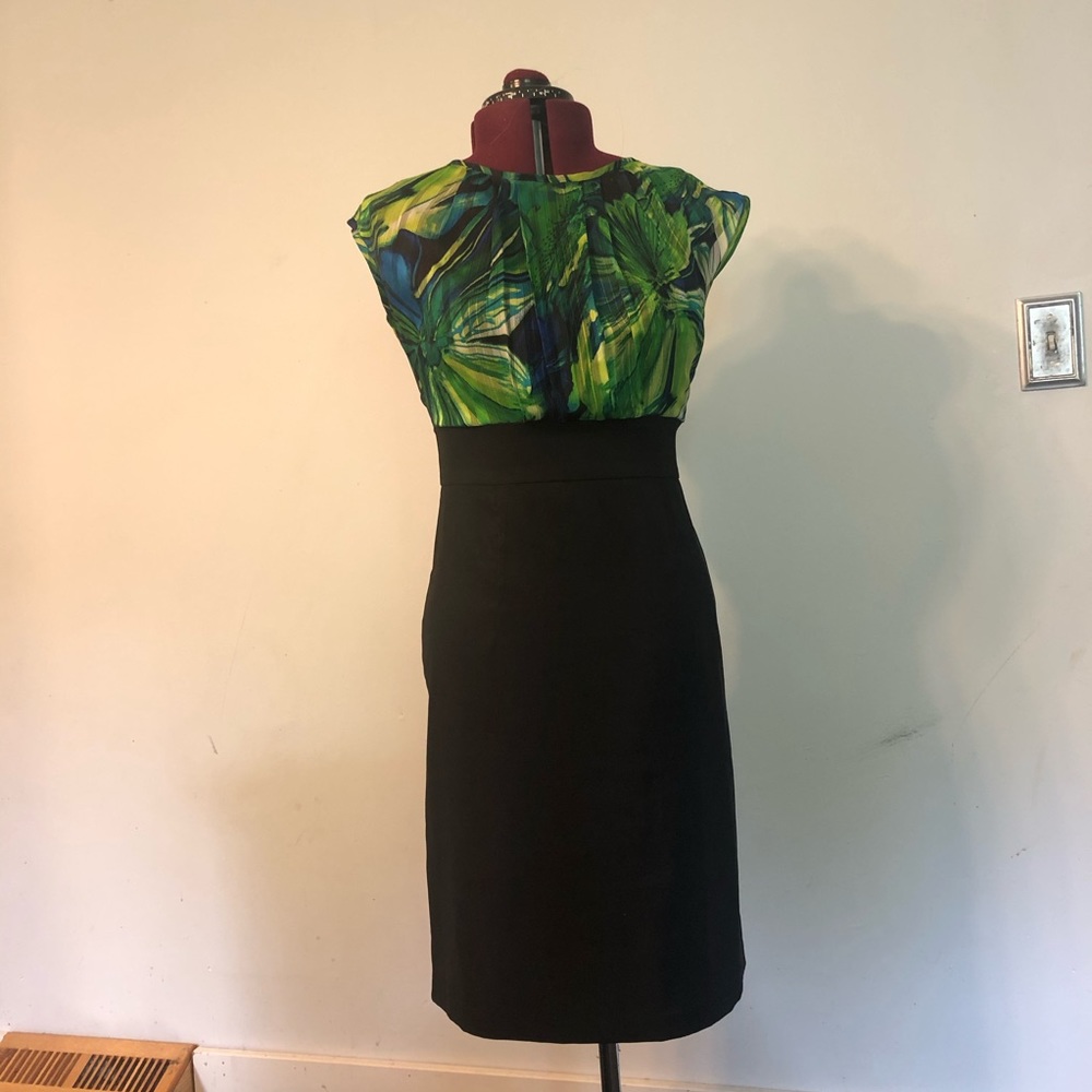 Gorgeous pencil dress with high neck.